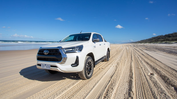 2022 Toyota Hilux SR5 evaluate white ute - static front 3/4 shoreline pic #1