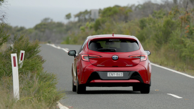 Toyota Corolla Ascent Sport hybrid 2022 rear utilizing