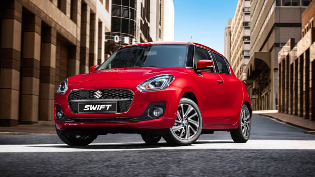 2020 Suzuki Swift front 3/4 shot red vehicle