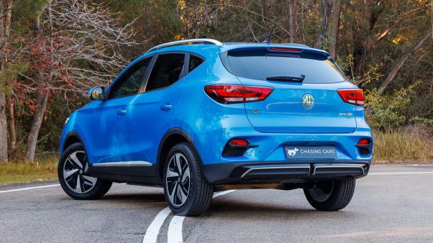 Rear left three quarter watch of the 2023 MG ZS EV small SUV in blue