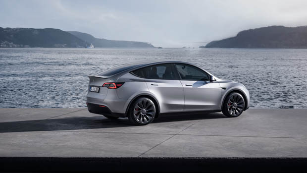 2023 Tesla Model Y silver rear 3/4 shot