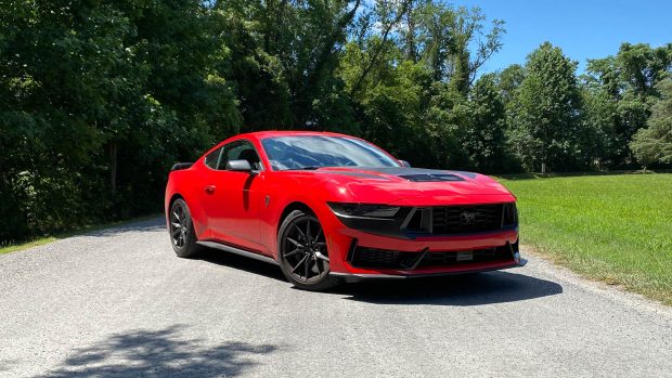 2024 Ford Mustang Darkish Horse pink front 3/4 static 2