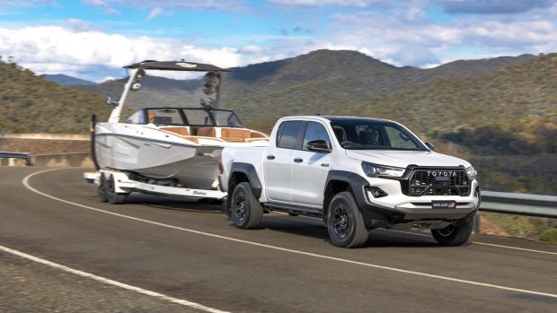 2023 Toyota Hilux GR Sport towing boat