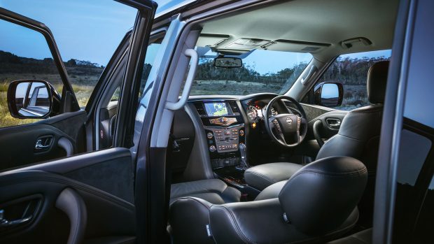 Interior and front seats of a 2023 Nissan Patrol Warrior done in dusky leather-primarily primarily based