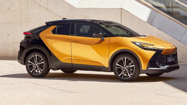 Yellow and murky 2023 Toyota C-HR shrimp SUV, entrance 3/4 exterior shot