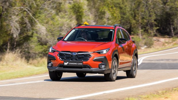 2023 Subaru Crosstrek 2.0S long termer front perspective driving shot 2