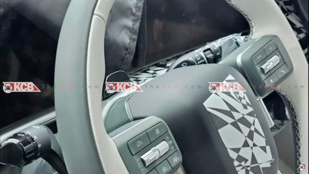 Steering wheel and centre console of the Hyundai Ioniq 7 leak printed by Korean Car Blog