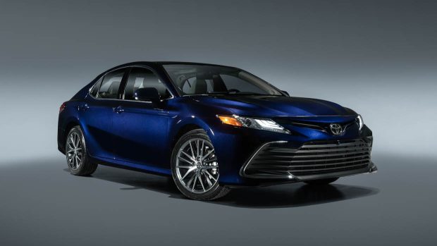 Toyota Camry darkish blue studio shot front 3/4