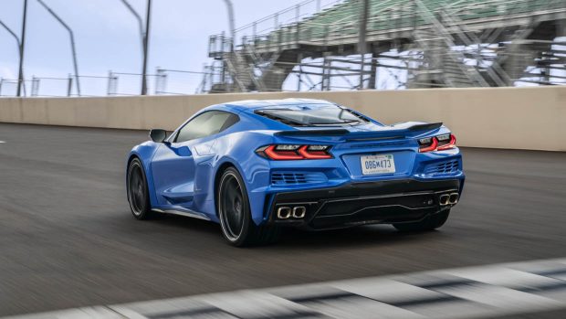 2024 Chevrolet Corvette E-Ray blue rear 3/4 riding shot