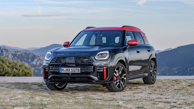 2024 Mini Countryman JCW front 3/4 with mountains in background