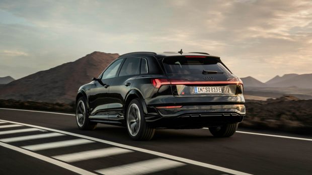 2024 Audi SQ8 E-Tron wagon driving rear 3/4