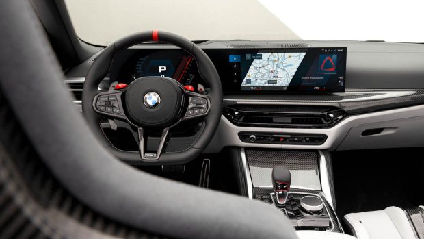 2024 BMW M4 Opponents xDrive convertible interior shot of wheel and monitors