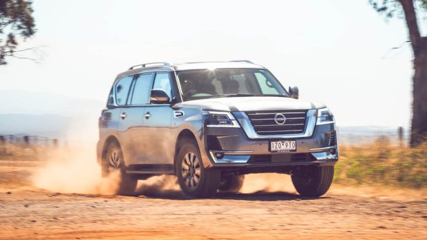 2024 Nissan Patrol Ti-L utilizing on dirt front 3/4